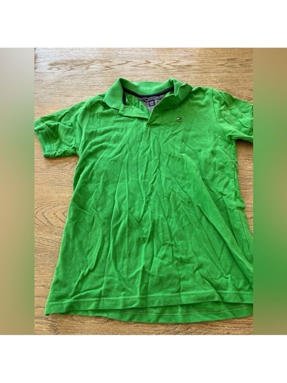 Tommy Hilfiger. green polo. Size 16-18. Boys